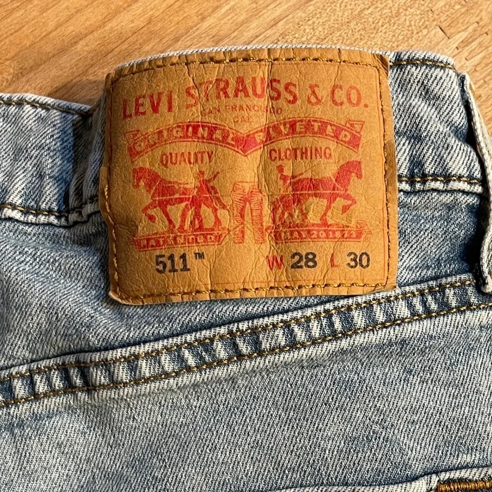 Levis 511 Slim Fit Light Wash Blue Denim Jeans Mens 28x30 WaterLess Stretch
